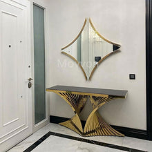 Load image into Gallery viewer, Black Glass Top Console Table with Striking Sculptural Gold Base – Modern Luxury Design