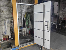 Load image into Gallery viewer, High-Security Modern White Metal Door with Stainless Steel Accents, Fireproof and Soundproof Core, Featuring Advanced Locking System for Residential and Commercial Use and Also hotels.