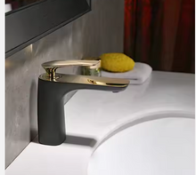 Загрузить изображение в средство просмотра галереи, Elegant Black and Gold Bathroom Faucet with Modern Single-Handle Design, Luxury Solid Brass Construction, and a Smooth Waterfall Flow for a Contemporary Vanity Sink