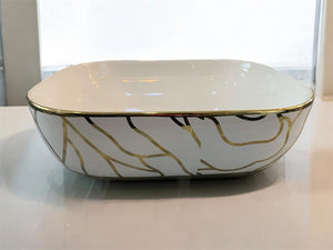 White Gold Square Porcelain Tabletop Wash Basin with Delicate Gold Vein Pattern, and Sleek Gold Trim