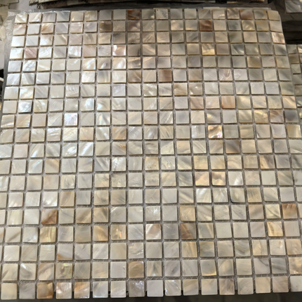 Sheet of small square tiles with a mottled gray pattern