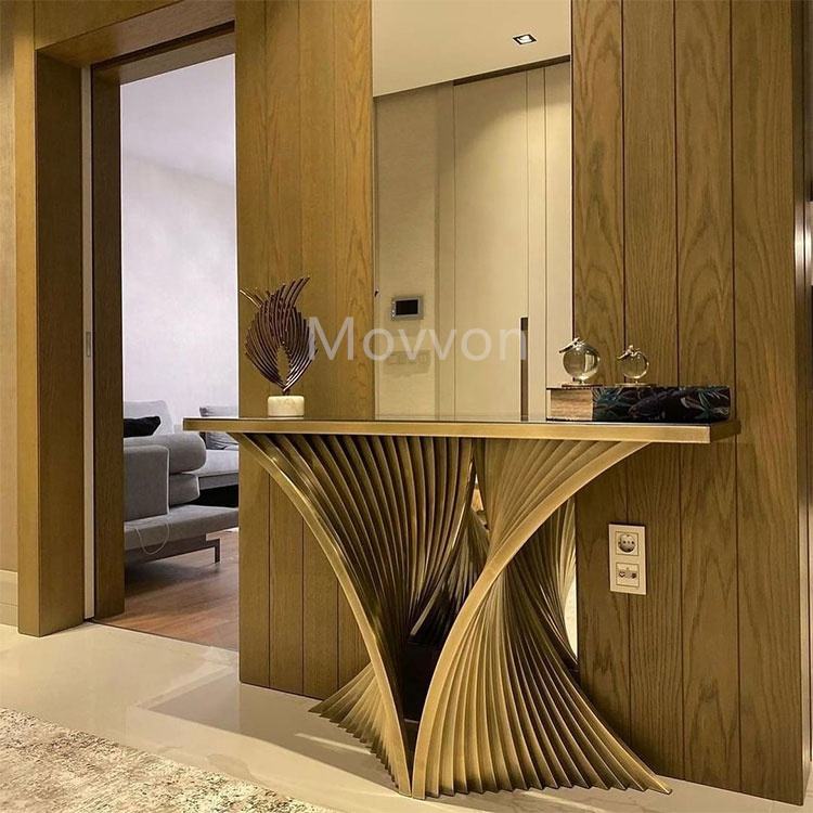 Wooden console table with decorative items in a modern interior stainless steel electroplated console table setting