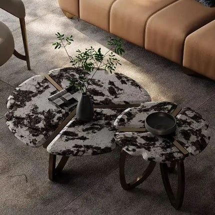 Table basse ronde de luxe minimaliste italienne en pierre, idéale pour les sols plats et toute la maison, avec une série de luminaires modernes. 