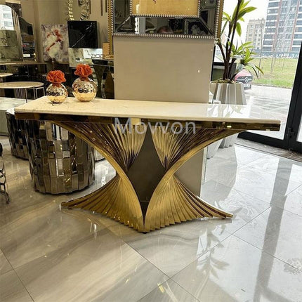 Wooden console table with decorative items in a modern interior stainless steel electroplated console table setting