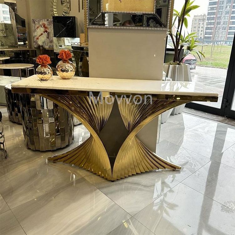 Wooden console table with decorative items in a modern interior stainless steel electroplated console table setting