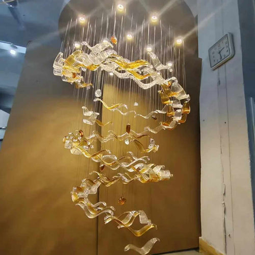 Modern pendant chandelier for stairs

Luxury hanging chandelier light

Statement chandelier for staircase

Grand foyer staircase chandelier

Elegant staircase chandelier