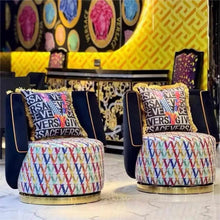 Load image into Gallery viewer, Luxurious Blend of Iconic Versace Style and Modern Comfort, Featuring the Signature Medusa Emblem, Plush Velvet Upholstery, and a Whimsical, Multi-Colored Patterned Base
