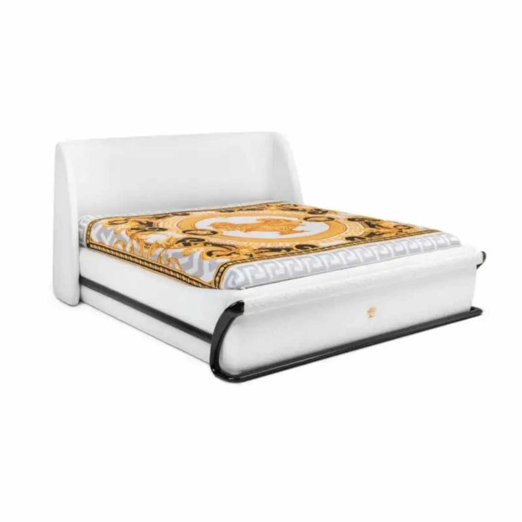 Luxurious Modern White Leather Bed with High-Gloss Black Accents, Elegant Gold Medusa-Inspired Bedding, Sleek Curved Frame, and Premium Upholstered Headboard