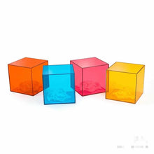 Cargar imagen en el visor de la galería, Acrylic Cubes in Vibrant Hues of Orange, Blue, Red, and Yellow, Showcasing Light Refraction and Shadow Play
