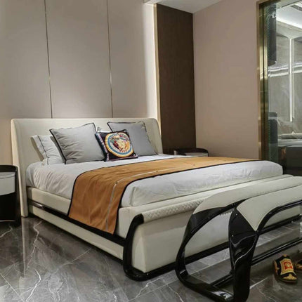 Elegant Contemporary Bedroom with a Luxurious Leather Upholstered Bed, High-Gloss Black Accents, Velvet and Silk Bedding, Marble Flooring, and a Modern Glass-Enclosed Space