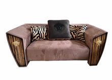 Lade das Bild in den Galerie-Viewer, Modern Fusion of Plush Mauve Velvet, Zebra-Print Accents, and Art Deco-Inspired Wood Paneling with Lion Head Hardware
