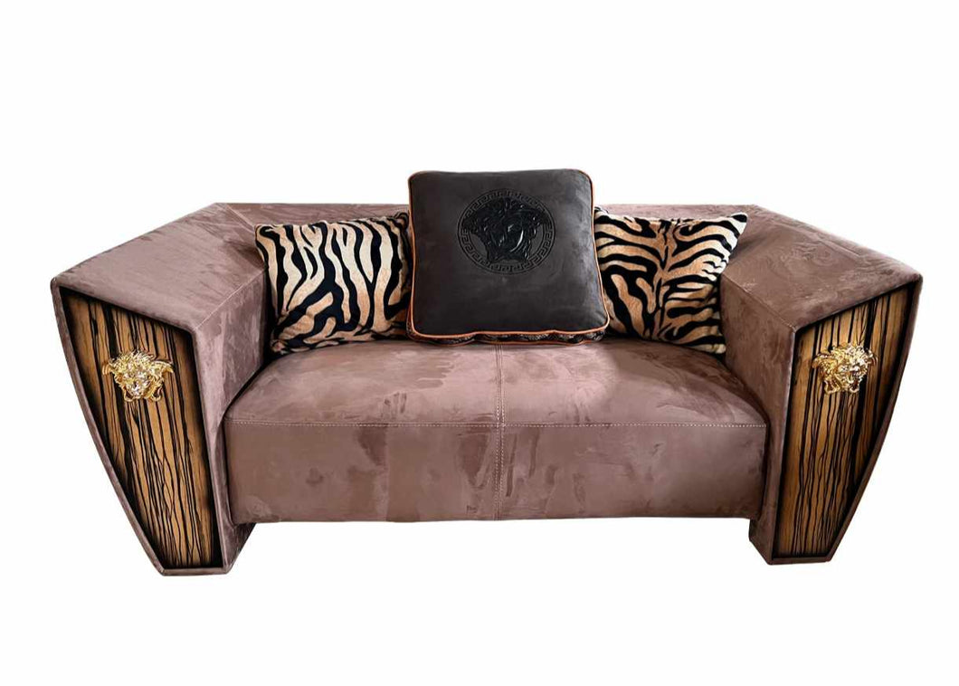 Modern Fusion of Plush Mauve Velvet, Zebra-Print Accents, and Art Deco-Inspired Wood Paneling with Lion Head Hardware