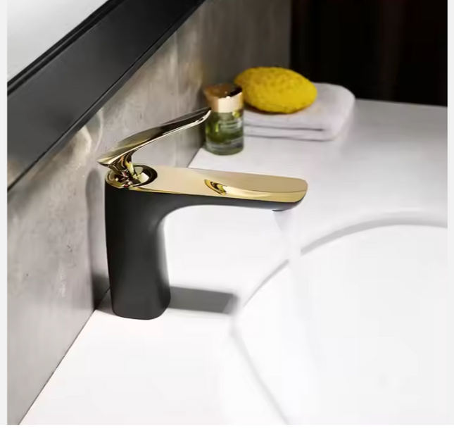 Elegant Black and Gold Bathroom Faucet with Modern Single-Handle Design, Luxury Solid Brass Construction, and a Smooth Waterfall Flow for a Contemporary Vanity Sink