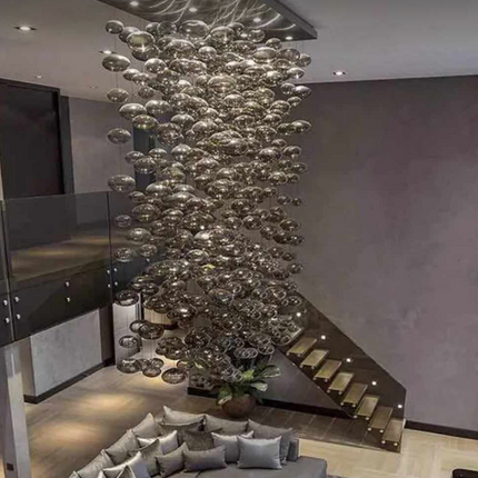 Plafonnier boule moderne rectangulaire à LED gris fumé en verre soufflé.