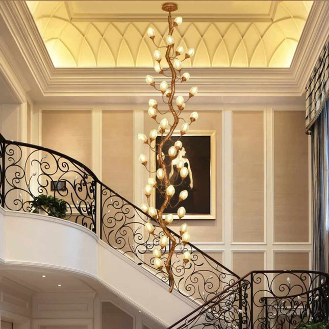 Sculptural Staircase Chandelier with Twisting Branches and Soft Glow Ascending Light Illuminating Elegance
