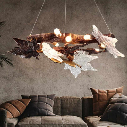 Rustic Leaf Halo A Modern Chandelier with Textured Branches and Frosted Glass Leaves Illuminating Natural Elegance Warm Light Filters