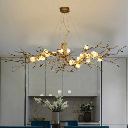 Blossom Branch Illumination A Whimsical Chandelier with Delicate Ceramic Flowers and Twisting Branches Casting a Warm Glow Natural Elegance Meets Modern Design
