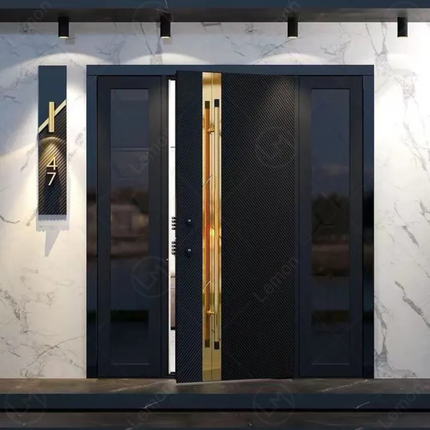 Modern black door with gold handle on a marble wall