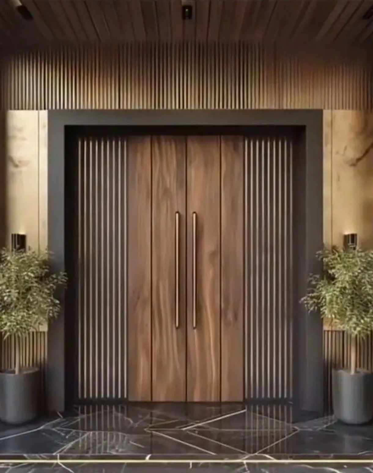 Custom size double solid wood entrance door with brown vertical grain finish and gold handles, set in a modern architectural facade