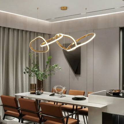 120cm pendant light with iconic infinity silhouette, made of corrosion-resistant 304 steel and finished with luxurious gold electroplating, perfect focal point for any room