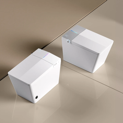 Two white electronic devices on a reflective surface with a neutral background