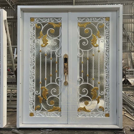 Decorative metal door with gold accents in a workshop setting