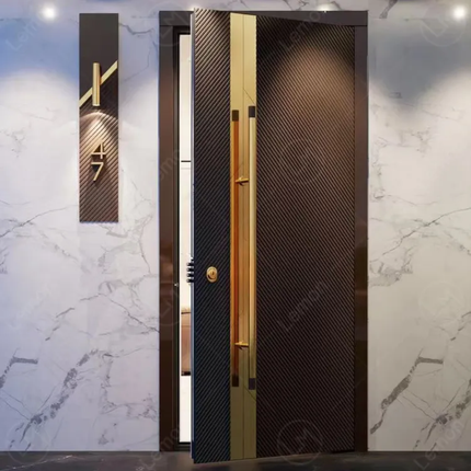 Modern door with gold handle on a marble wall