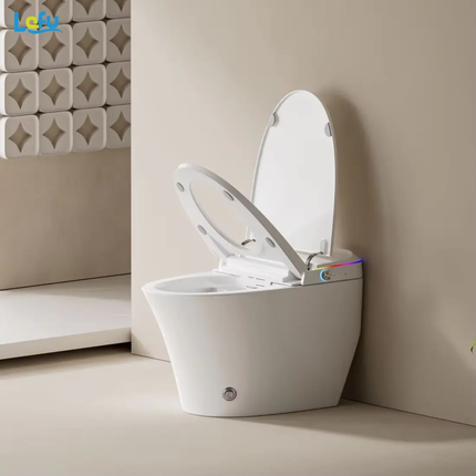Modern white toilet with open lid in a bathroom setting