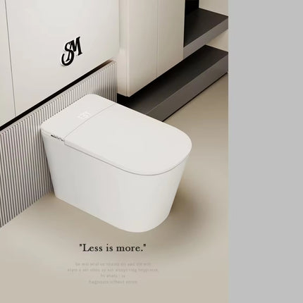 Modern white toilet in a minimalistic bathroom setting with 'Less is more' text.