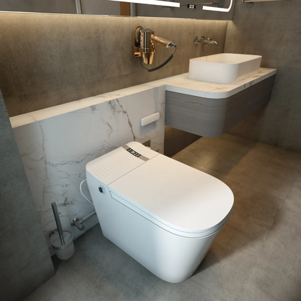 Modern bathroom with a white toilet and sink against a gray wall.