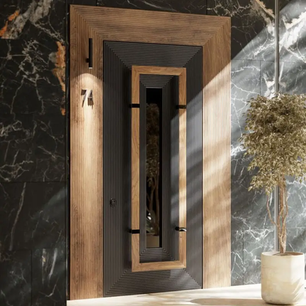 Wooden door with black frame on a marble wall