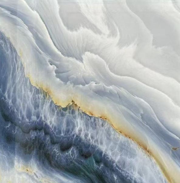 Modern 60x60cm electroplated porcelain tile with marble-inspired design in icy white, deep blue, and golden veining