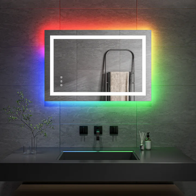 An RGB LED light mirror with multicolored changing lights, displayed in a bathroom setting above a bathtub and sink, showcasing a colorful, dynamic light effect.