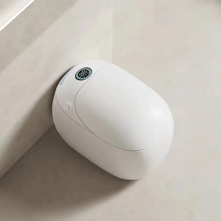 White electronic device with a green label on a light-colored surface