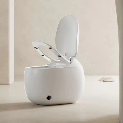 White toilet with open lid on a beige background