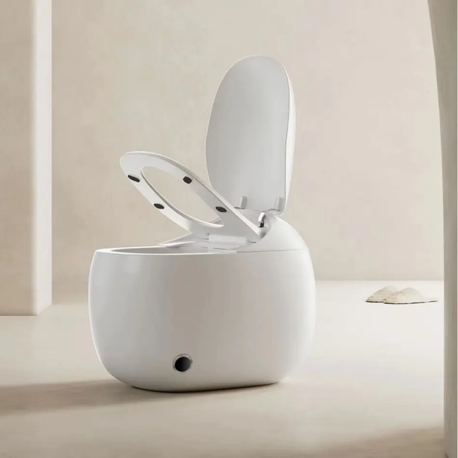 White toilet with open lid on a beige background