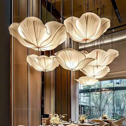 Floral pendant lights hanging in a modern dining room.