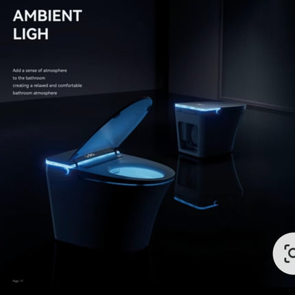 Bathroom scene with a toilet and bidet illuminated by ambient light, emphasizing a relaxing atmosphere.