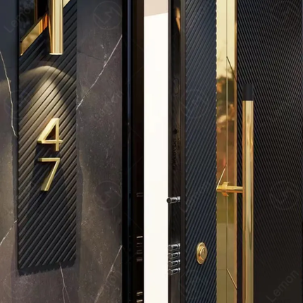 Black door with gold number '47' and handle