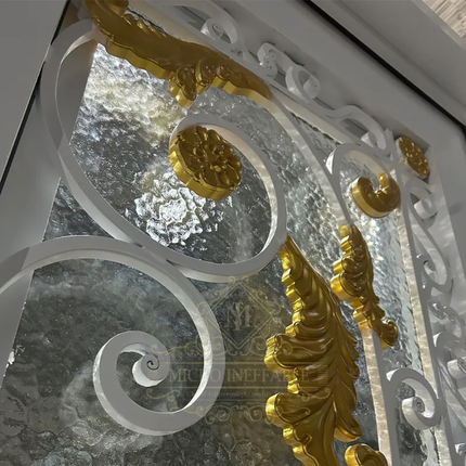 Decorative metal gate with gold and white elements
