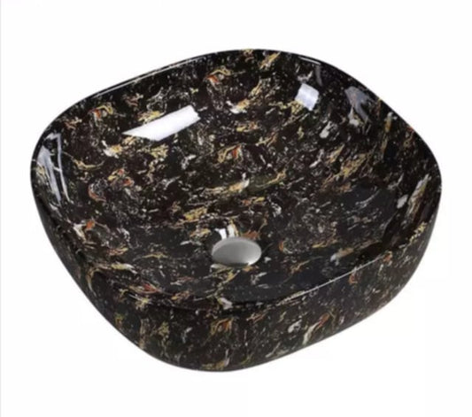 Square marble basin with a glossy black finish featuring natural color accents and a subtle, organic veining pattern.