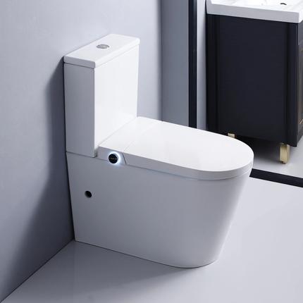 Modern white toilet in a bathroom setting with a light gray floor and wall.