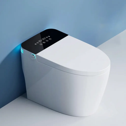 Modern toilet with digital control panel against a blue wall