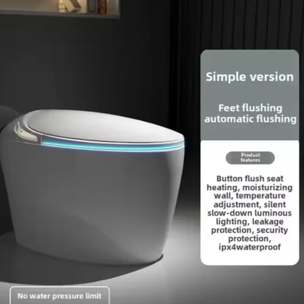 Modern toilet with digital display in a dark bathroom setting
