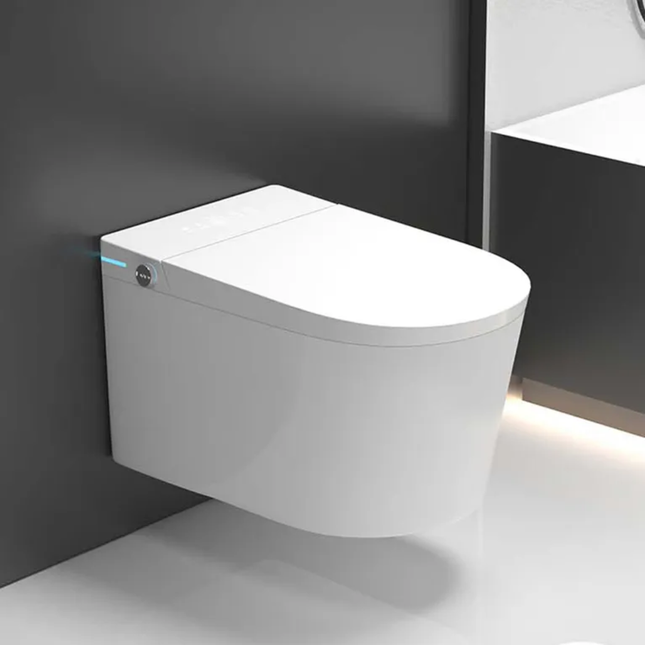 Modern white toilet against a dark wall in a bathroom setting