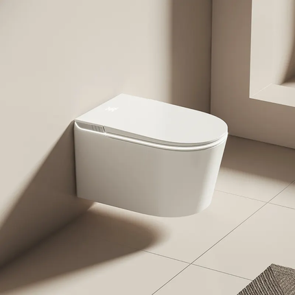 Wall-mounted white toilet in a bathroom setting