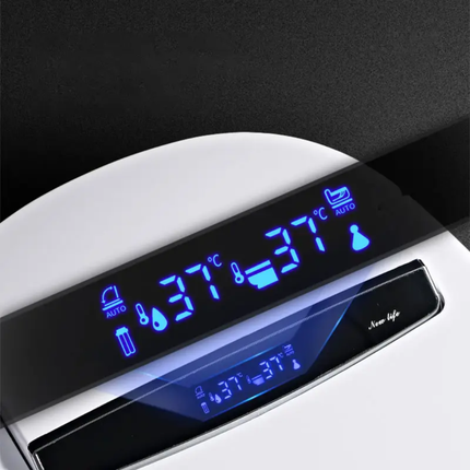Digital temperature display on a white appliance with blue text