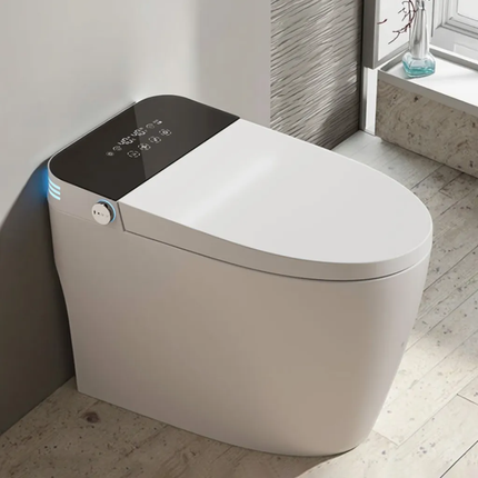 Modern toilet with digital control panel in a bathroom setting