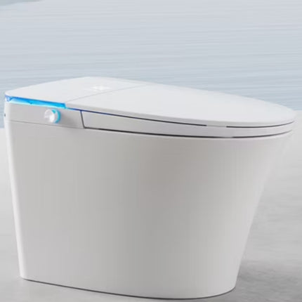 Modern white toilet with a lid and seat on a light gray background