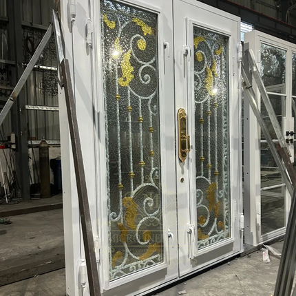 Decorative glass doors with metal frames in a workshop setting